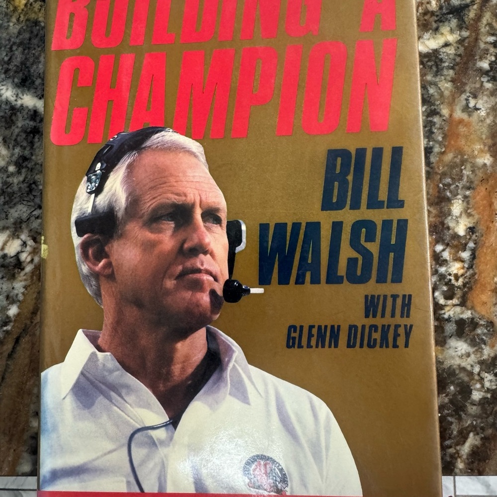 Building a Champion by Bill Walsh - Hardcover Book in Gold & Red